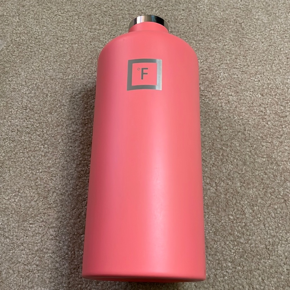 Iron Flask 64 oz insulated tumbler with 3 lids. Coral color.